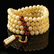 Load image into Gallery viewer, Amber white flower beeswax 108 bead chicken oil yellow men and women models bracelets Baiyun red couple necklace bracelets prayer beads
