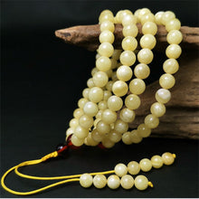 Load image into Gallery viewer, Amber white flower beeswax 108 bead chicken oil yellow men and women models bracelets Baiyun red couple necklace bracelets prayer beads
