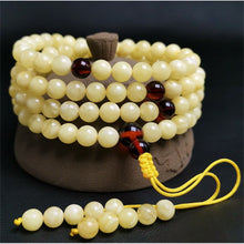 Load image into Gallery viewer, Amber white flower beeswax 108 bead chicken oil yellow men and women models bracelets Baiyun red couple necklace bracelets prayer beads
